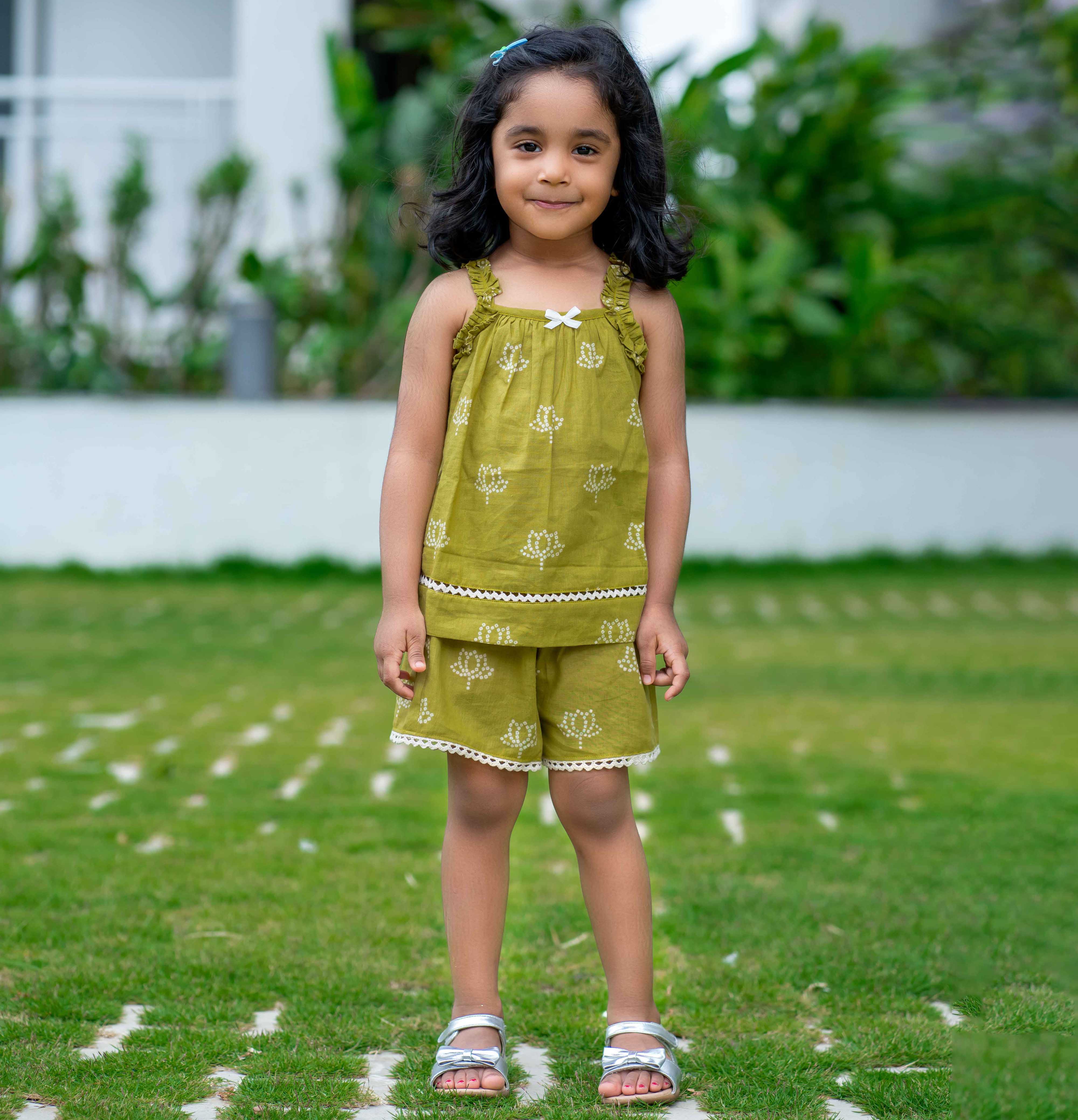 Girl wearing Green cotton pajama set with shorts