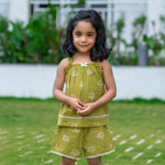 Girl wearing Green cotton pajama set with shorts