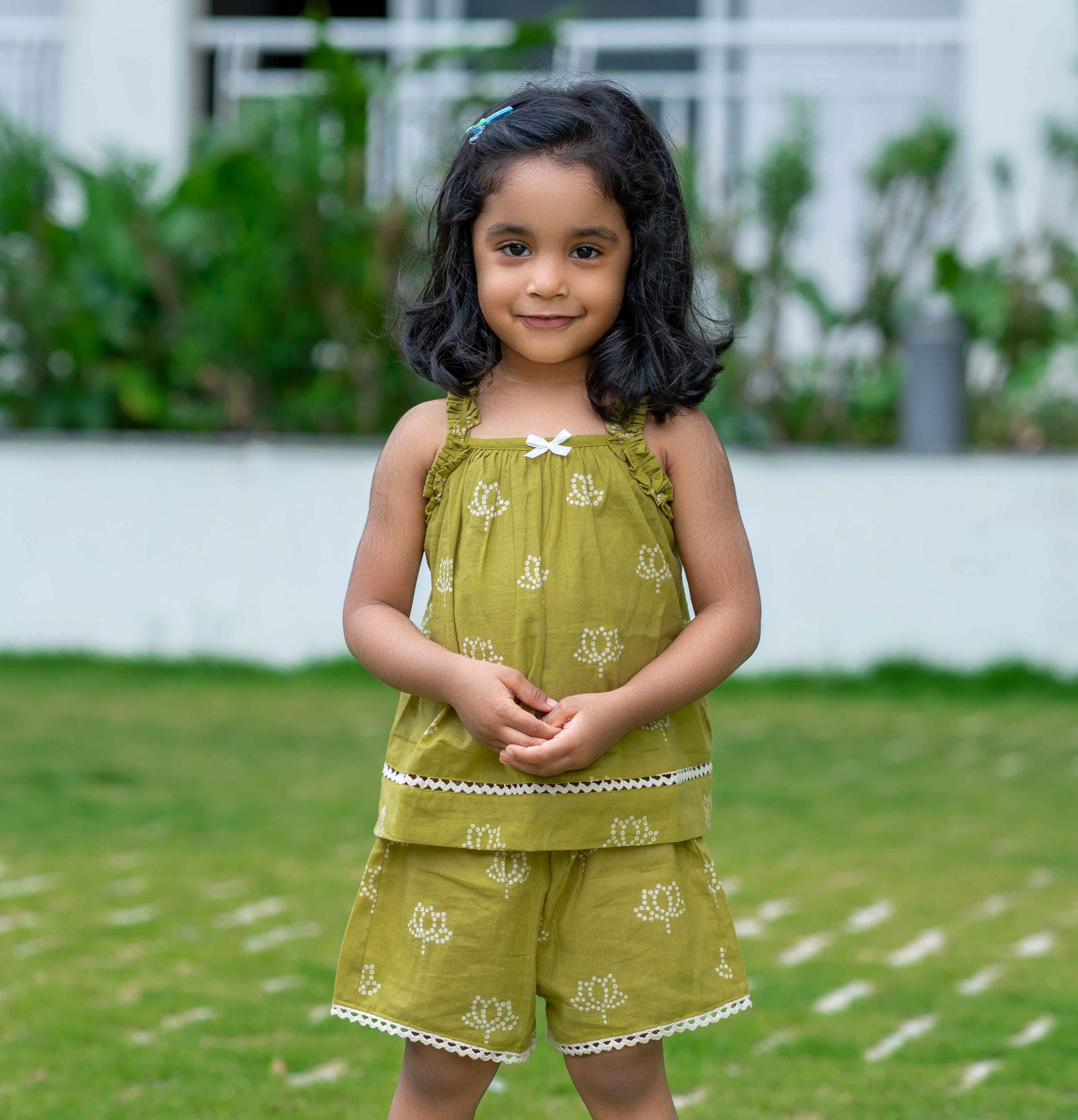 Girl wearing Green cotton pajama set with shorts