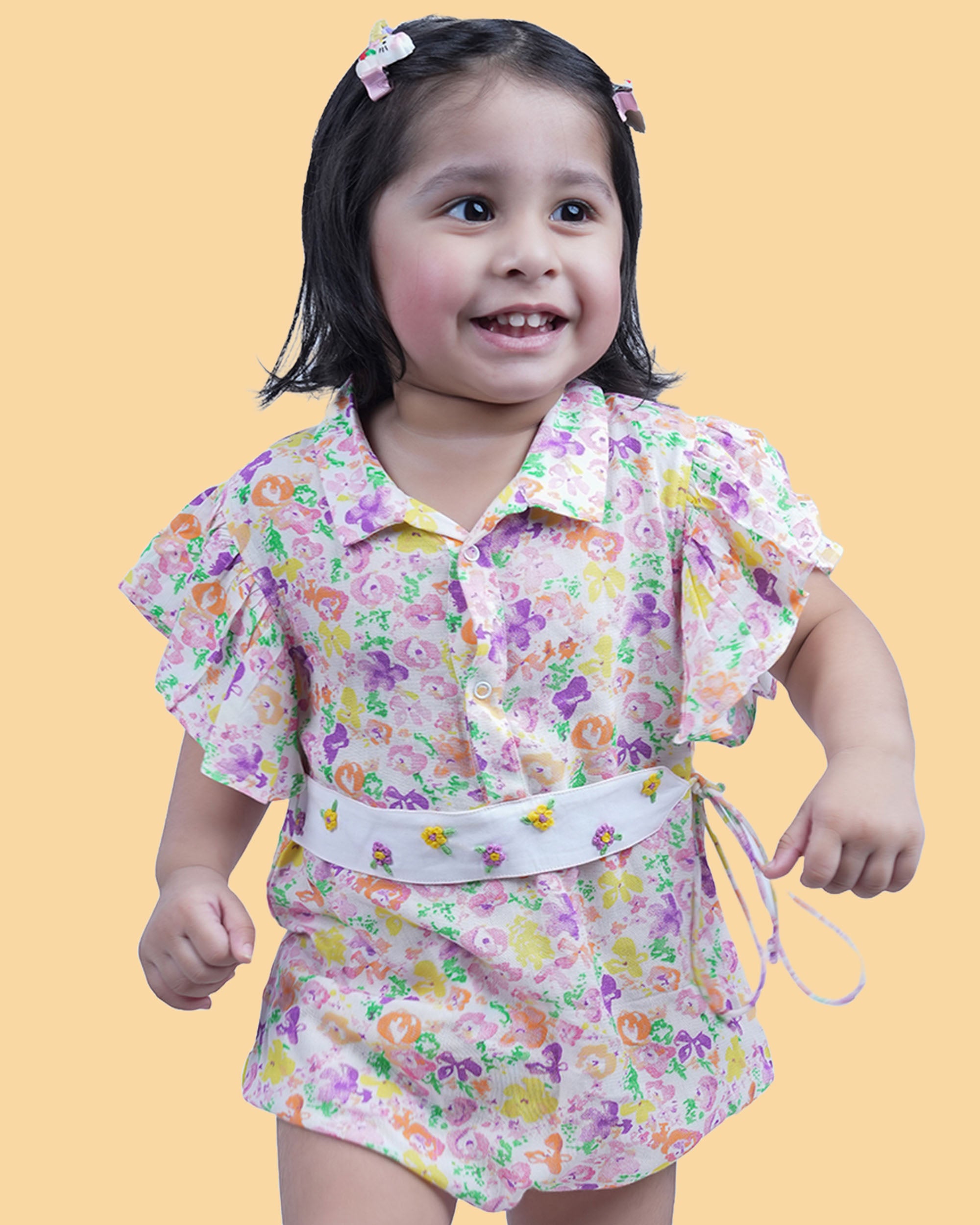 Baby Girl wearing floral printed cotton Romper with cloth belt