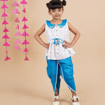 A girl wearing Blue Ikkat Cotton Kurta and Dhoti Pant