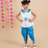 A girl wearing Blue Ikkat Cotton Kurta and Dhoti Pant