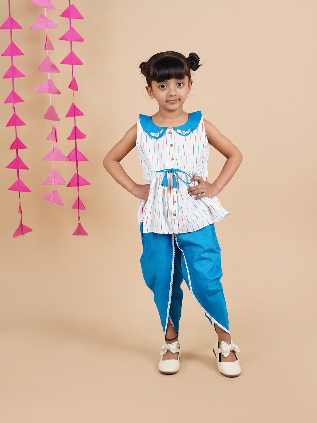 A girl wearing Blue Ikkat Cotton Kurta and Dhoti Pant