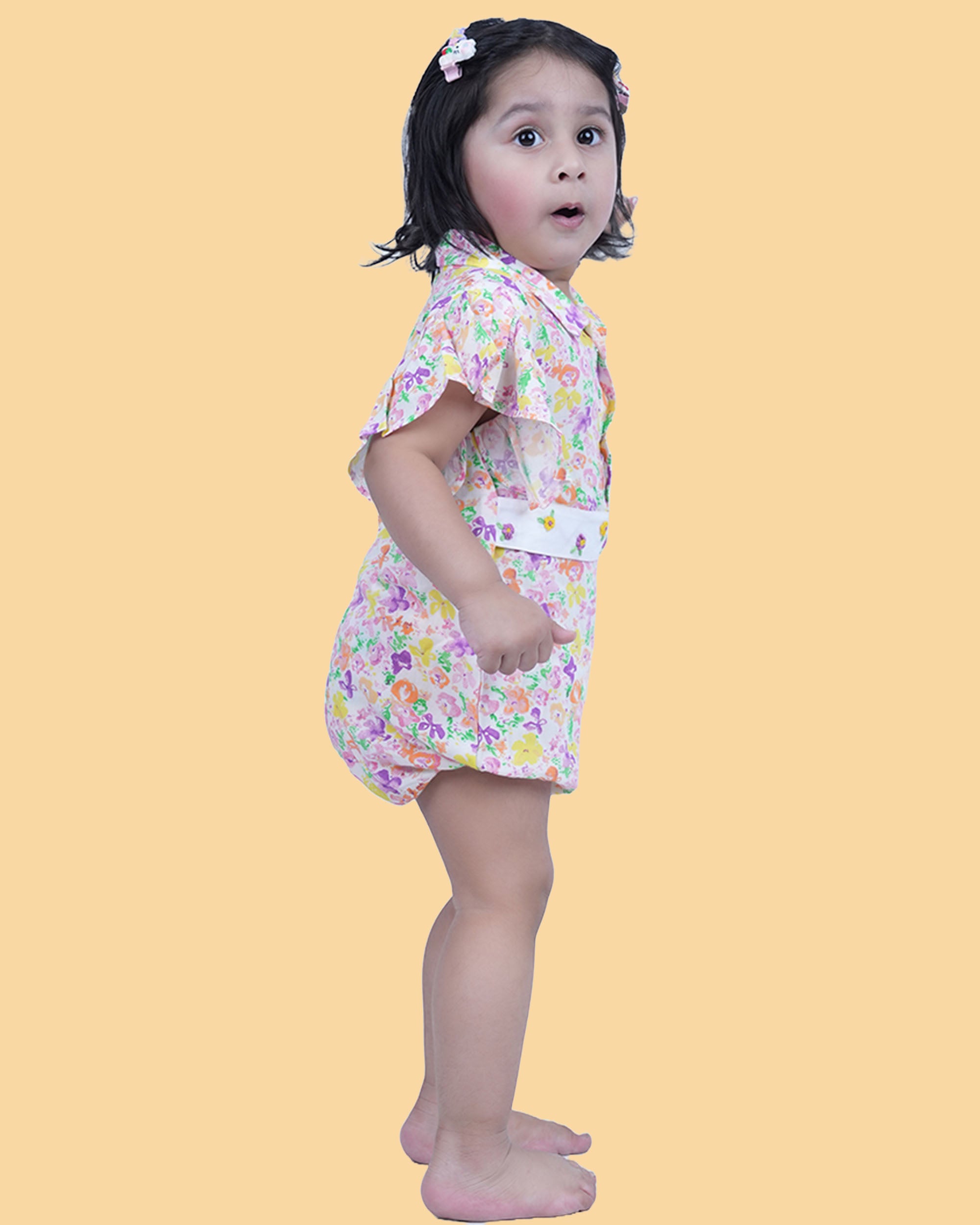 Baby Girl wearing floral printed cotton Romper with cloth belt