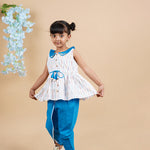 A girl wearing Blue Ikkat Cotton Kurta and Dhoti Pant