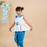 A girl wearing Blue Ikkat Cotton Kurta and Dhoti Pant