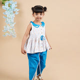 A girl wearing Blue Ikkat Cotton Kurta and Dhoti Pant