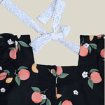 Black Cotton Top with Peaches printed on it