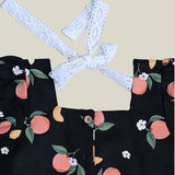 Black Cotton Top with Peaches printed on it