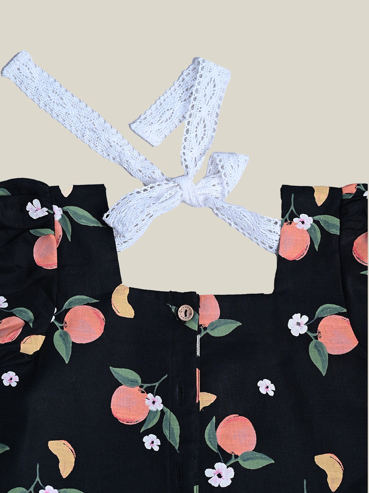 Black Cotton Top with Peaches printed on it