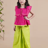 Girl wearing Red top with embroidery and lime green palazzo pants