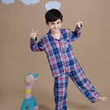 A boy wearing checks cotton night suit 