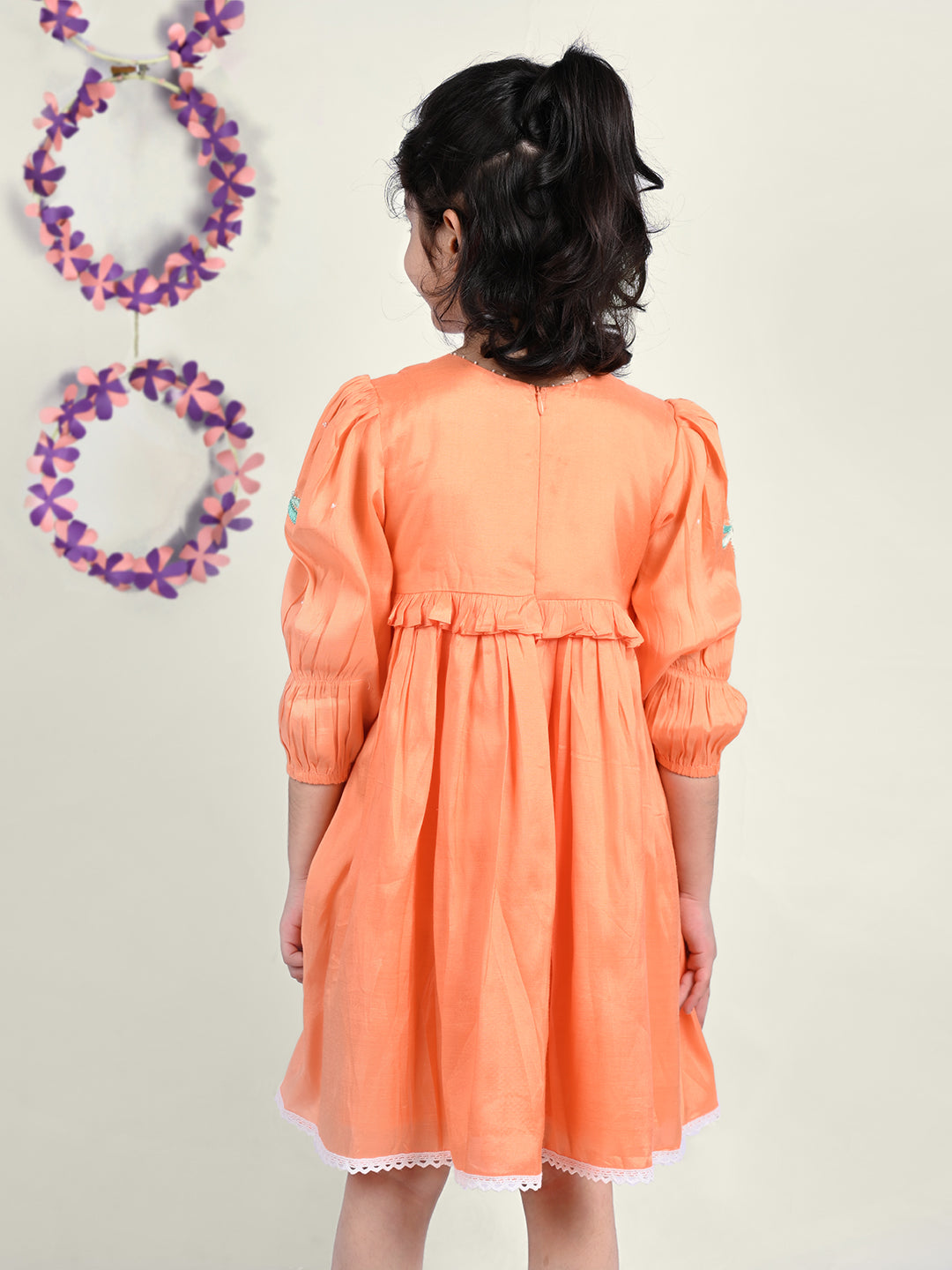 Girl wearing Dragon flies embroidered  orange cotton frock