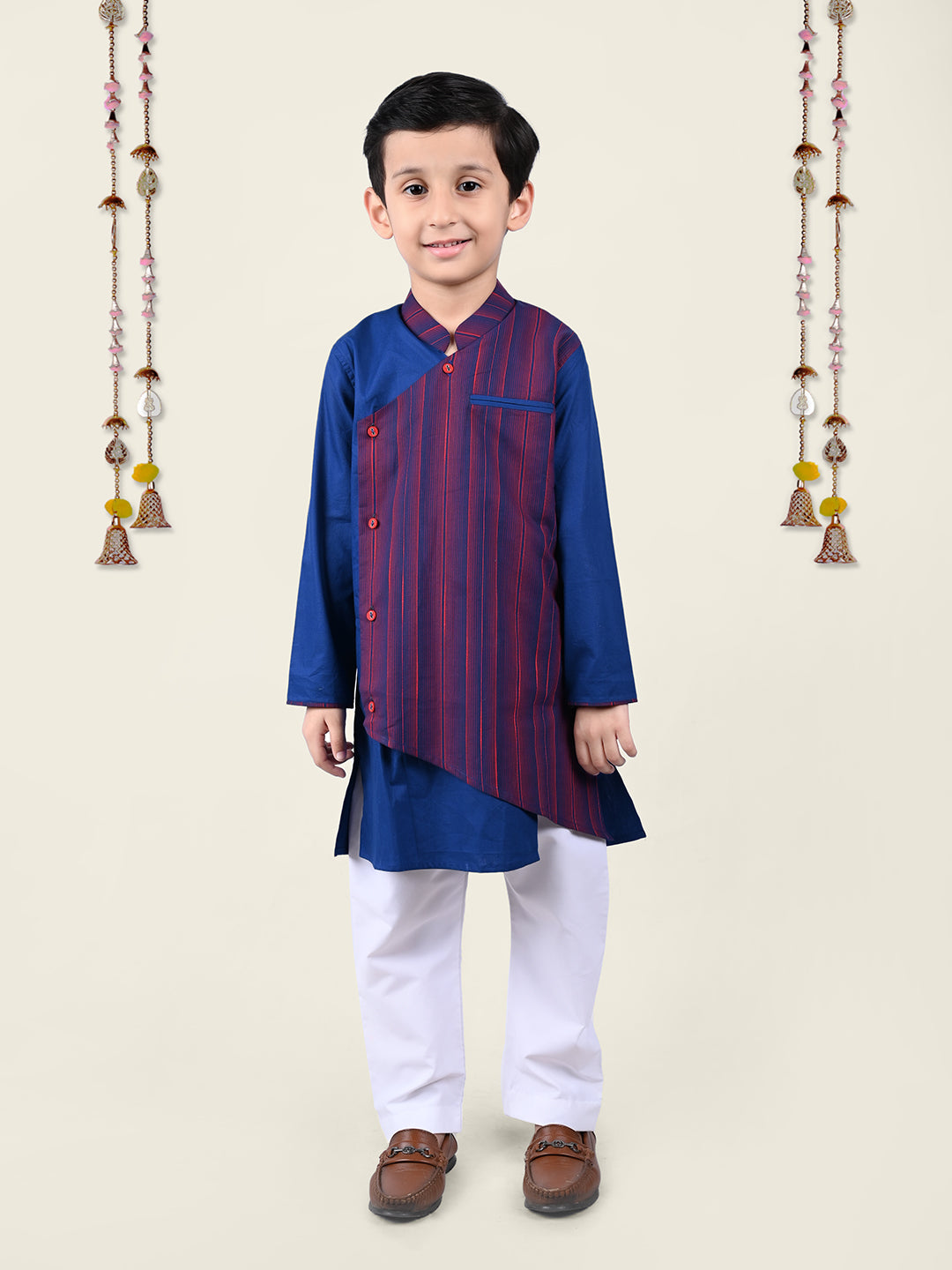 A boy Wearing Blue Asymmnetric Kurta