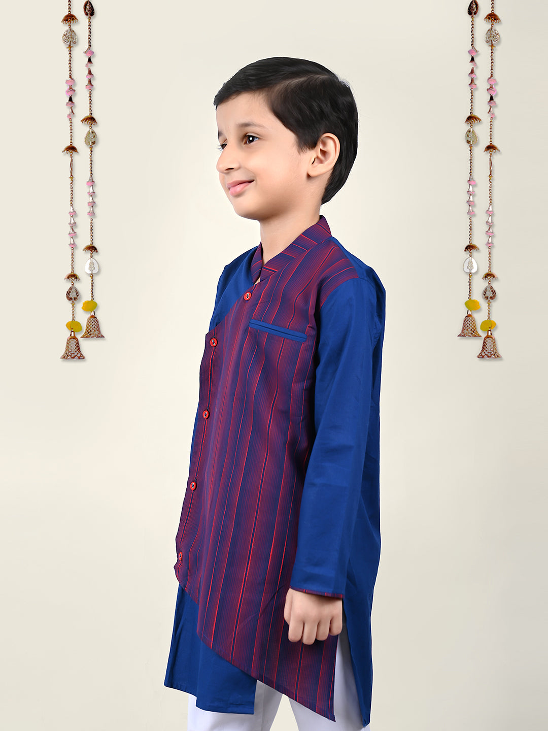 A boy Wearing Blue Asymmnetric Kurta