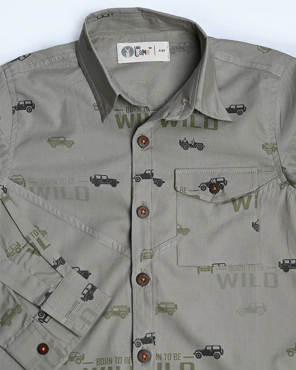 Khaki cotton shirt with full sleeves and has cars printed on it