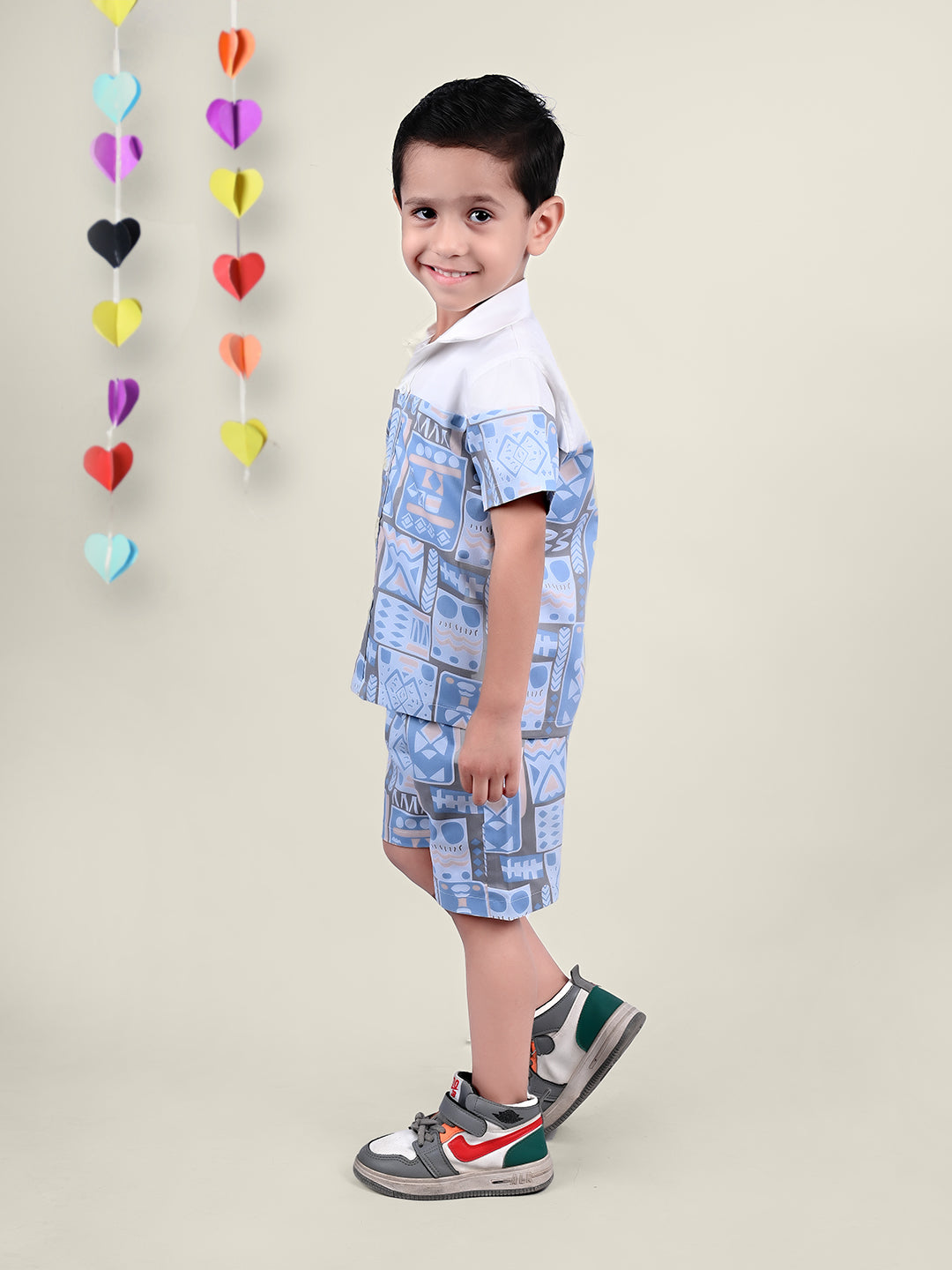 A boy wearing Blue and White Printed coord set