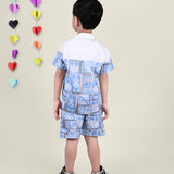 A boy wearing Blue and White Printed coord set