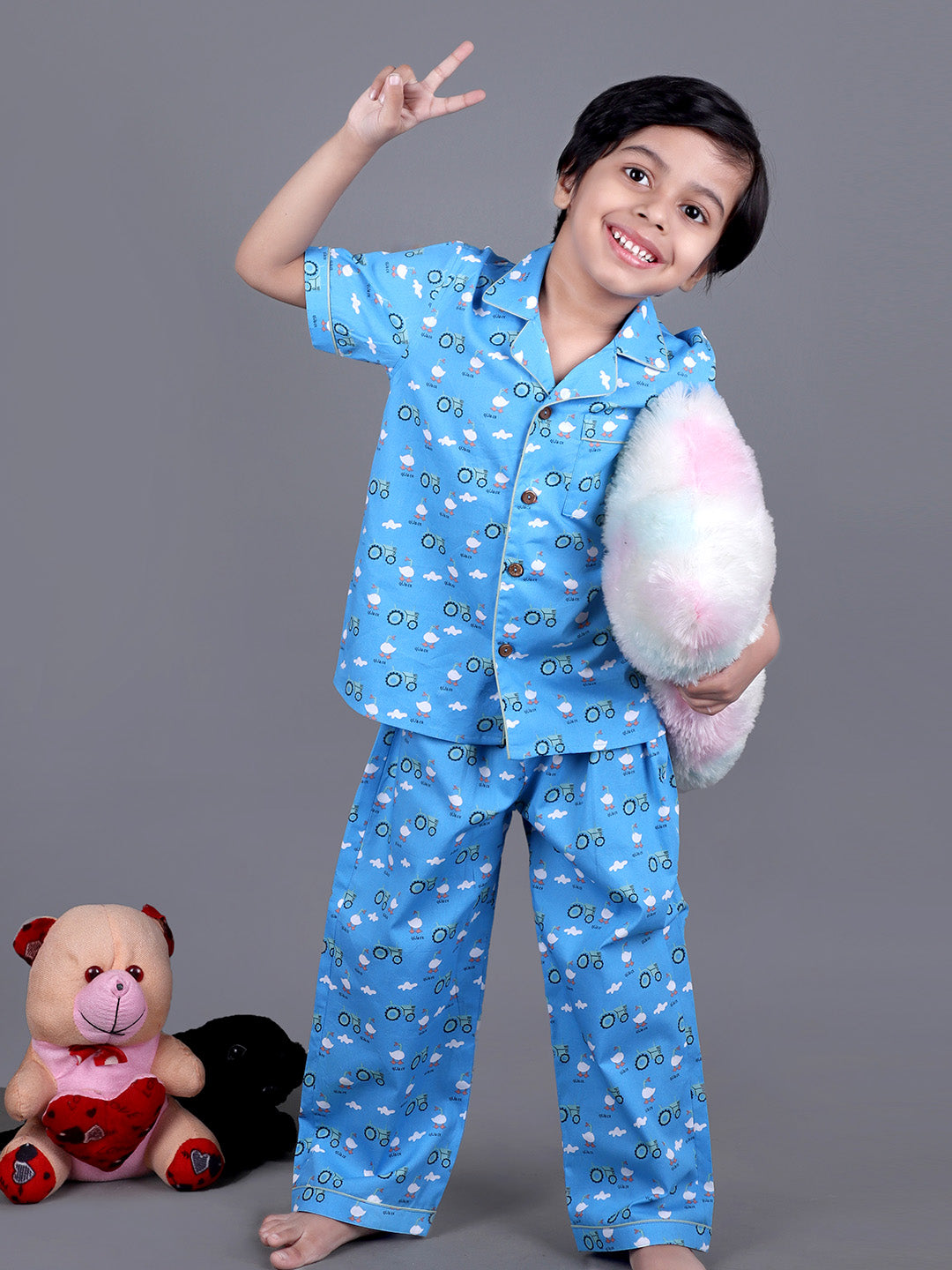 Boy wearing Blue Cotton night suit with ducks printed on it