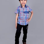 Boy wearing Blue Checks shirt with endless fun written on it