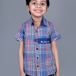 Boy wearing Blue Checks shirt with endless fun written on it