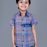 Boy wearing Blue Checks shirt with endless fun written on it