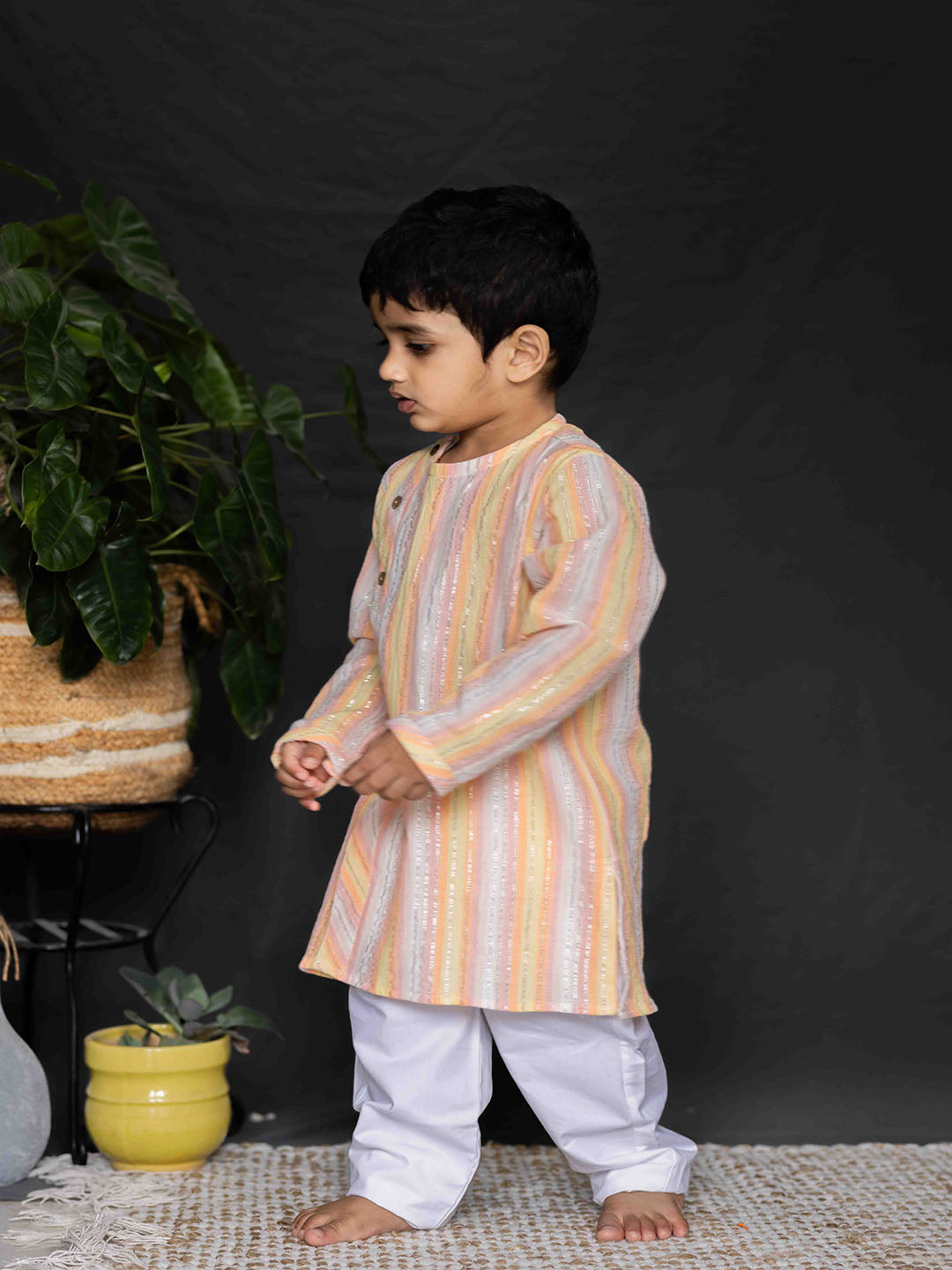 Boy wearing Stripes Kurta and White Pants