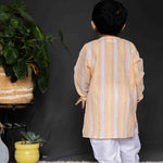 Boy wearing Stripes Kurta and White Pants