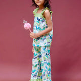 A girl wearing butterfly printed cotton suit with capri