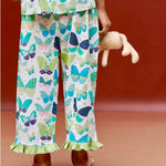 A girl wearing butterfly printed cotton suit with capri