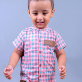 boy wearing Pink checks shirt with Mandarain coller