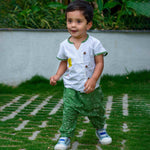 Baby Boy wearing Cotton Angrakha Kurta with kite embroidery and green pants