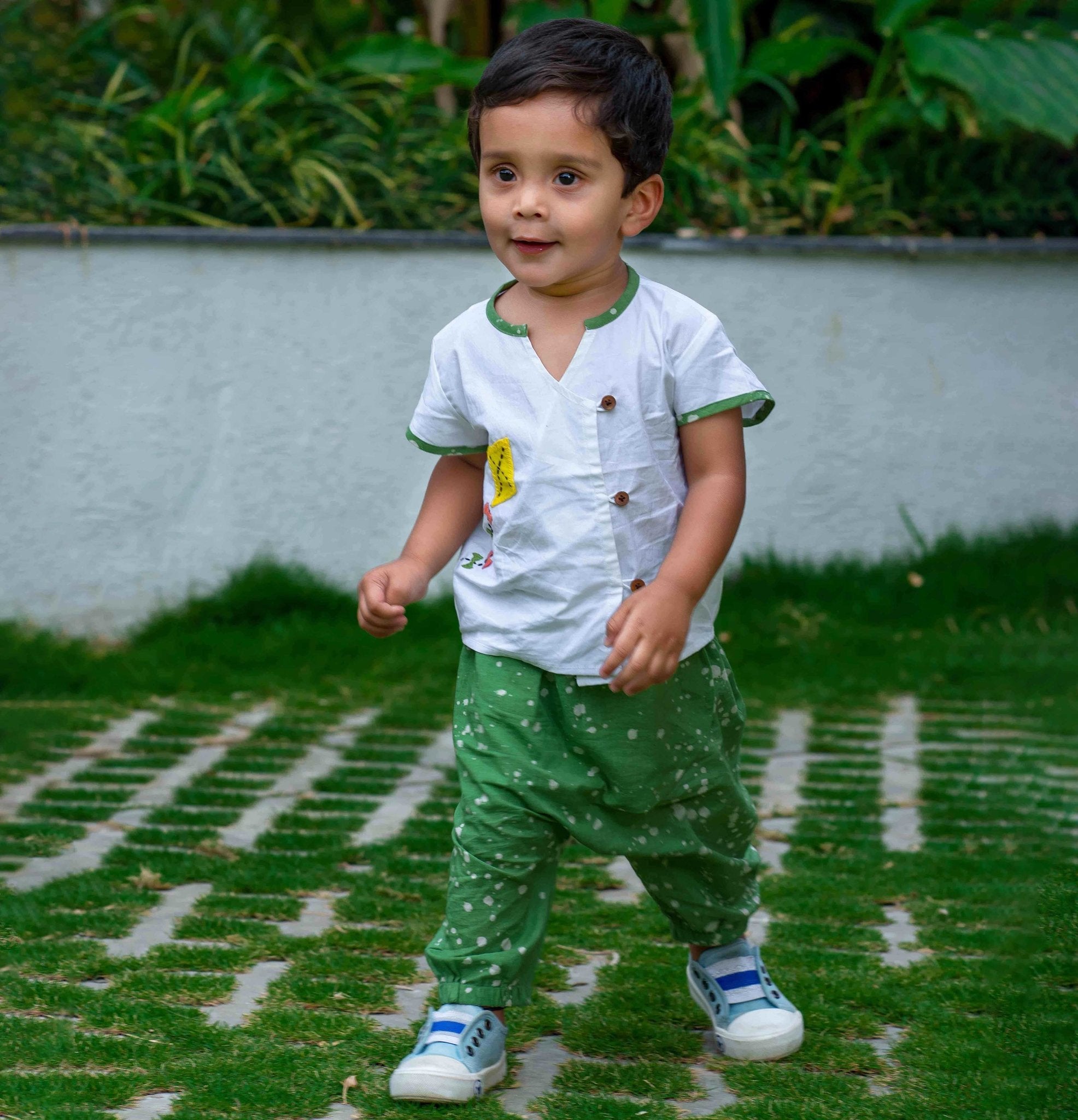 Baby Boy wearing Cotton Angrakha Kurta with kite embroidery and green pants