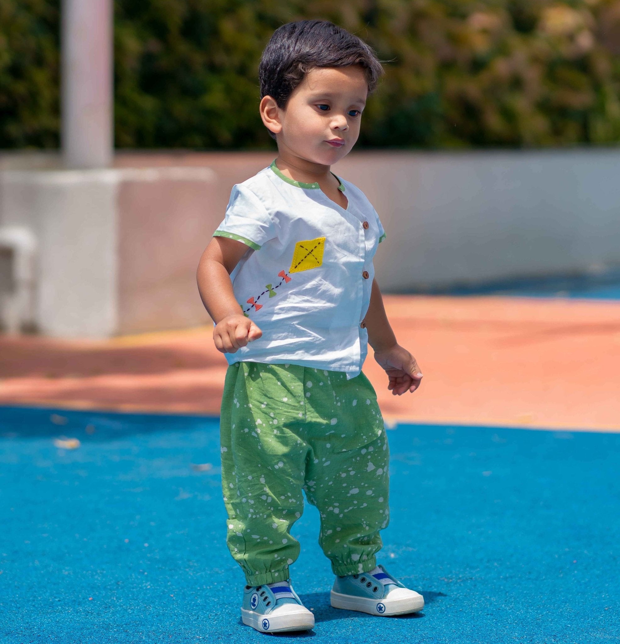 Baby Boy wearing Cotton Angrakha Kurta with kite embroidery and green pants